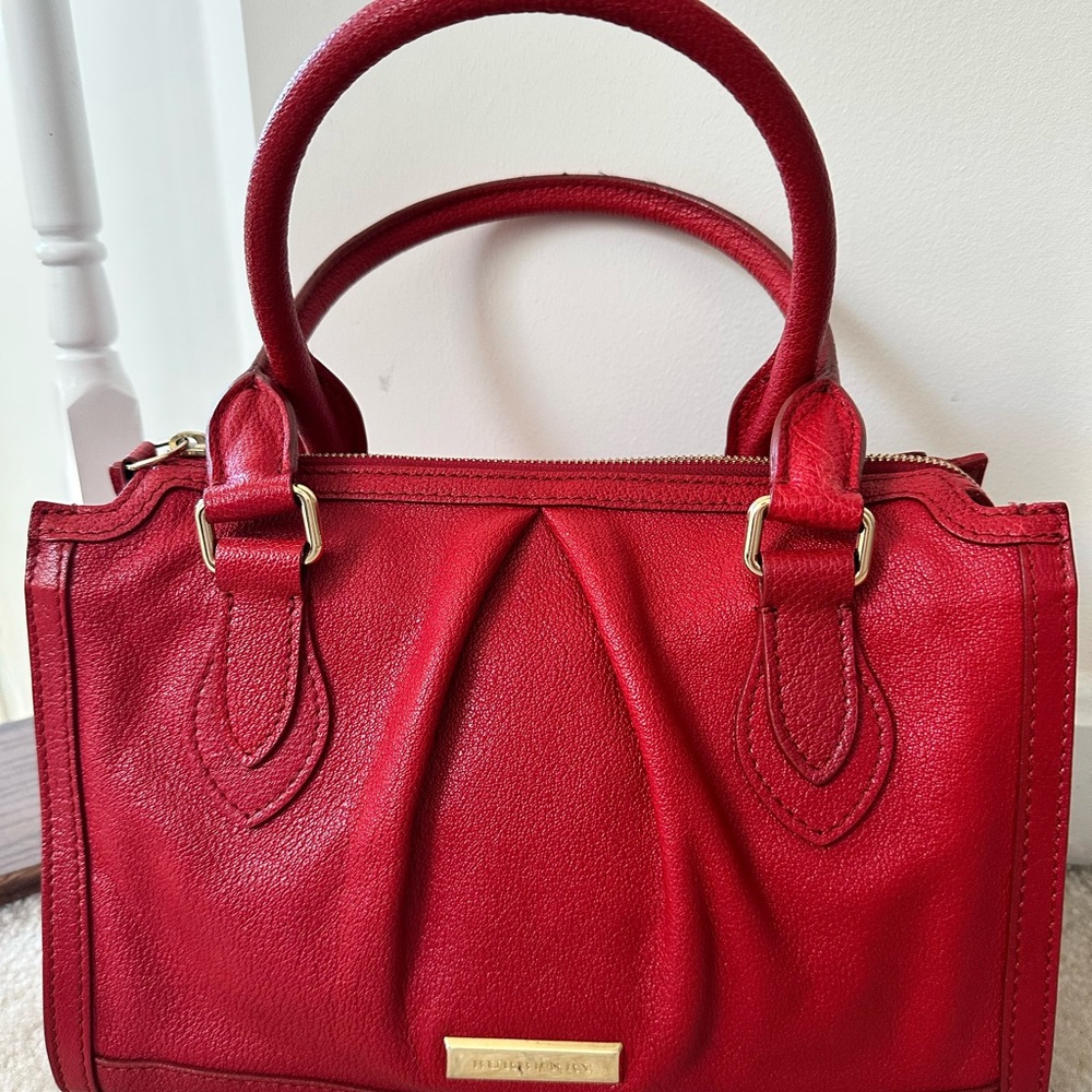Burberry Red Leather with Gold Hardware.